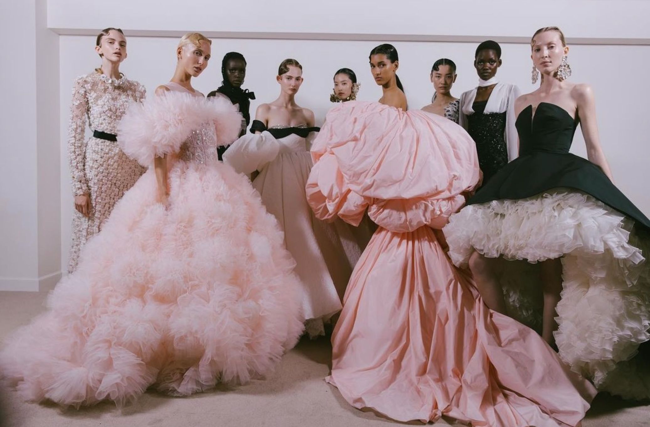 Models wear a selection of dresses from the new Giambattista Valli Haute Couture 25 collection.
